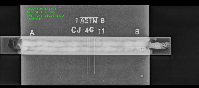 Radiographic Image of a 3/8" Thick Test Plate welded with E7018 in the 4G position by Student CJ Crow. TCAT UNICOI night program.